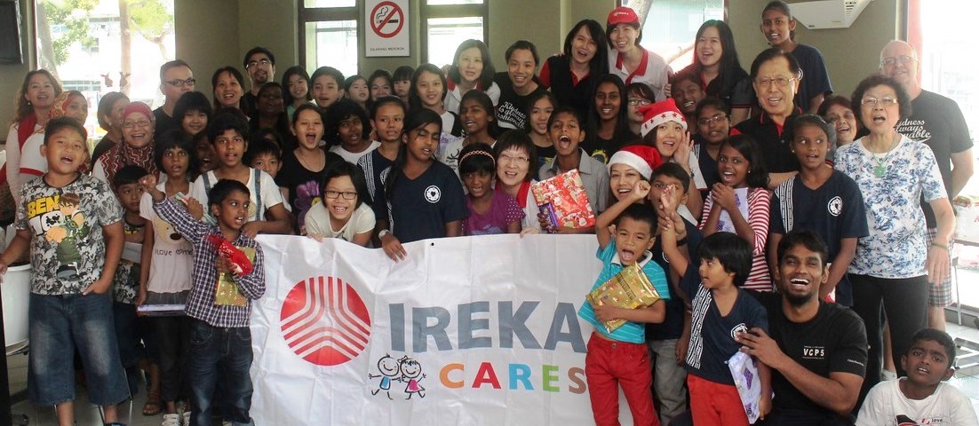Group photo of the IREKA CARES volunteers and children from Rumah Hope and Lighthouse Children_s Welfare Home