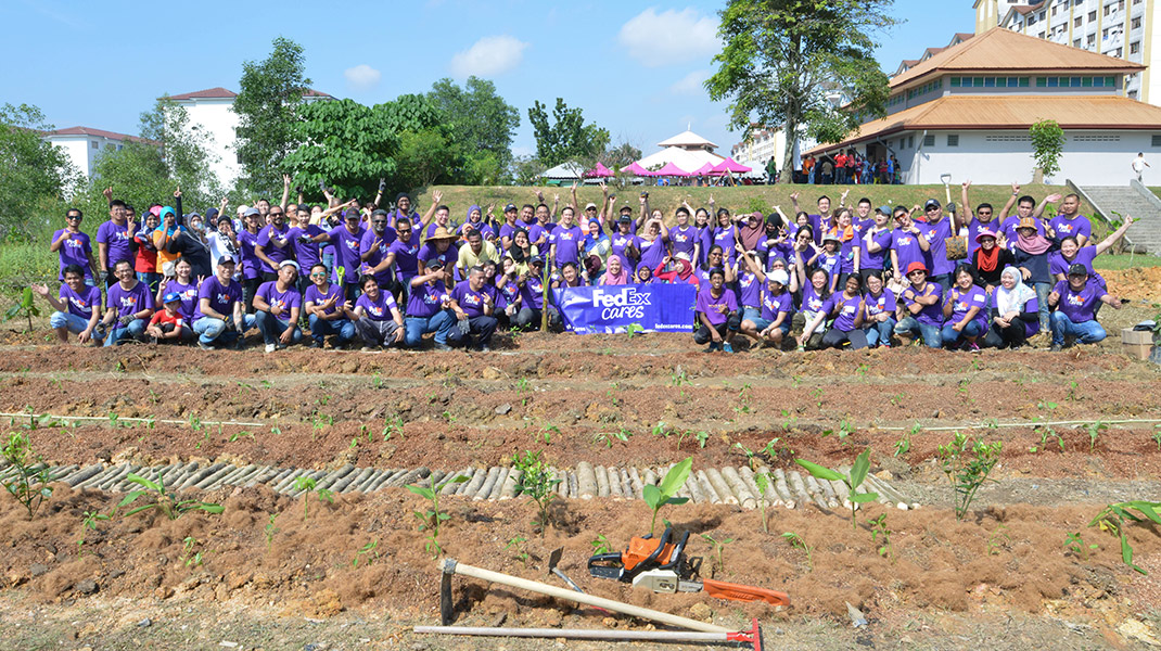 FedEx volunteers join the Food Aid Foundation at Enggang Apartment which aimed to help the Enggang community and two other locations embrace urban farming FedEx volunteers join the Food Aid Foundation at Enggang Apartment which aimed to help the Enggang community and two other locations embrace urban farming
