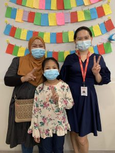 Dr Fiona (right) with patient Mia and her mother after a successful surgery leading to Mias improved eyesight