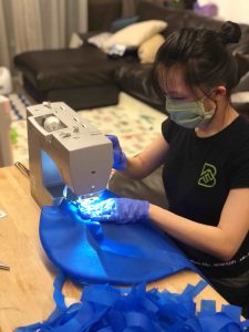 Volunteer making PPE for frontliners