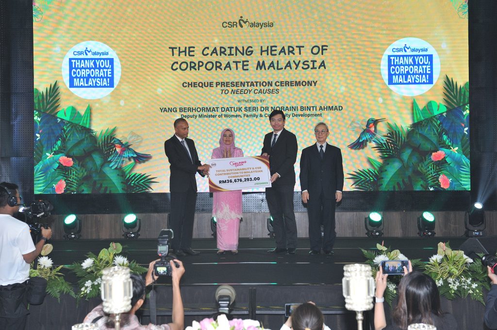 CSR Awards 2024 - STM Lottery Sdn. Bhd. presenting a cheque for needy causes